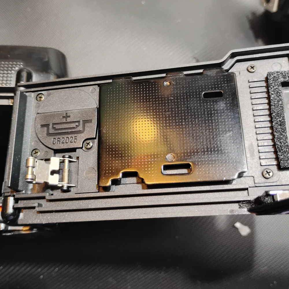 Nikon Black Camera with Gold Detail